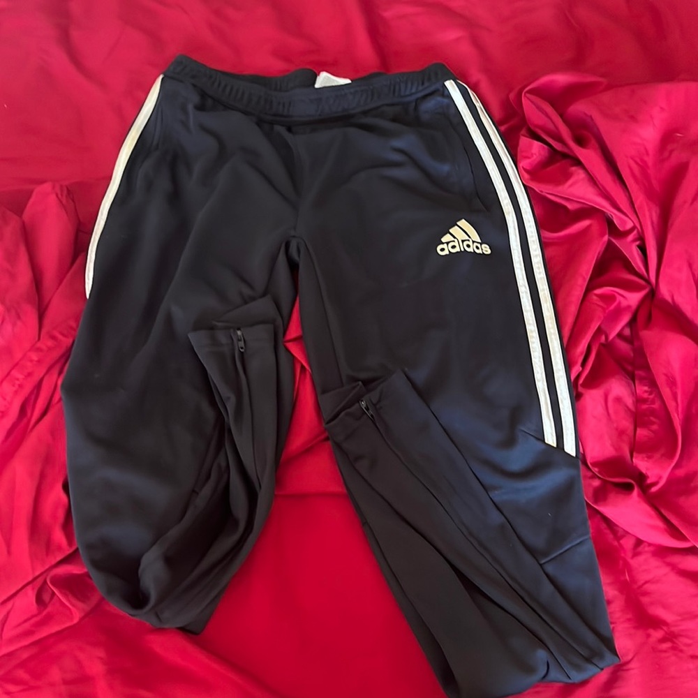 Gold stripe adidas pants